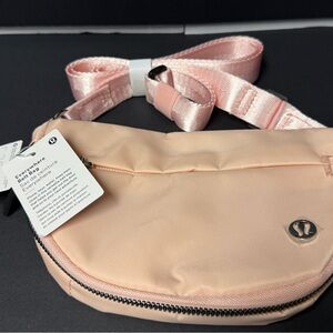 Everywhere Belt Bag in pink.  Lulu style fanny/ belt bag.